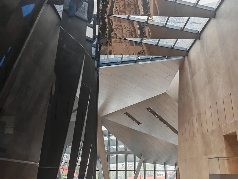 Faceted stone and glass atrium inside the lobby